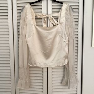 Lulu’s cream satin top with sheer sleeves